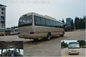 Panjang 7.7M Toyota Coaster Van Passenger Mini Bus Dengan Tangki Bahan Bakar 70L pemasok